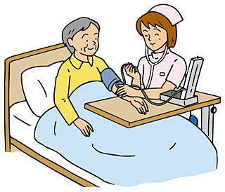 血圧を測る看護師